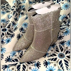 Ankle block heel boots, size 12 women’s and it’s sparkly.